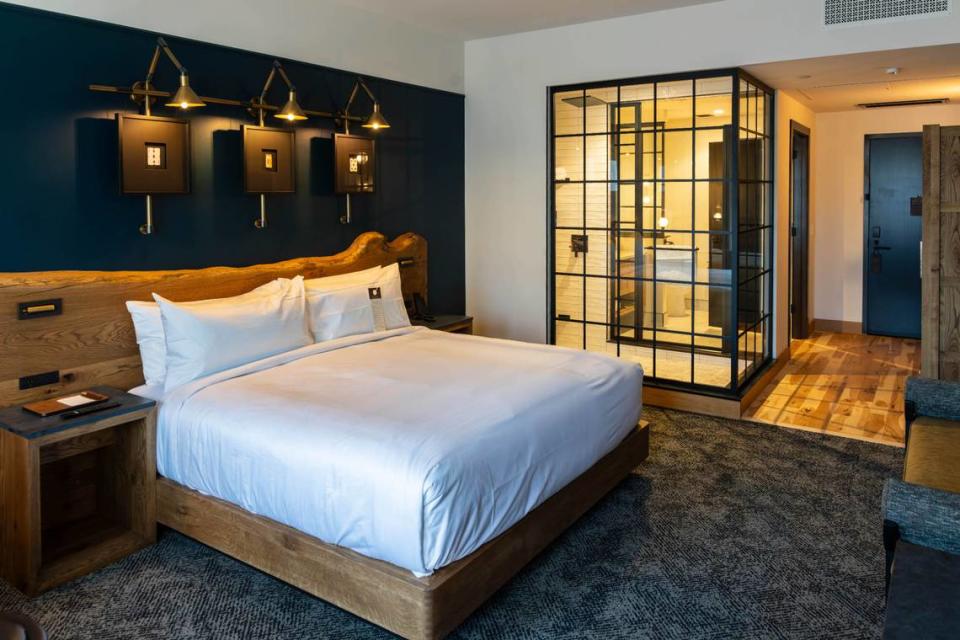 A guest bedroom.  All rooms include Bluetooth speakers, a 65-inch TV and a minibar.