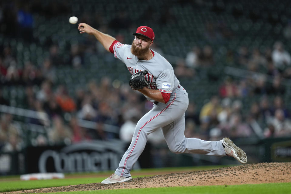 Cincinnati Reds relief pitcher Buck Farmer throws against the Detroit Tigers in the 10th inning of a baseball game, Tuesday, Sept. 12, 2023, in Detroit. (AP Photo/Paul Sancya)