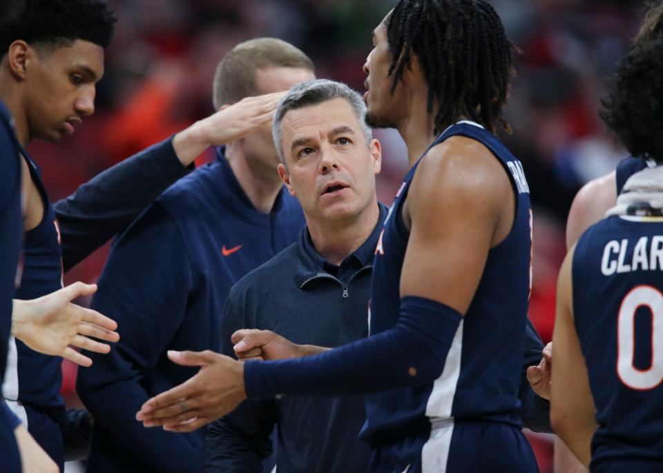 Virginia's head coach Tony Bennett instructs his team against U of L during their game at the Yum Center in Louisville, Ky. on Feb. 15, 2023.