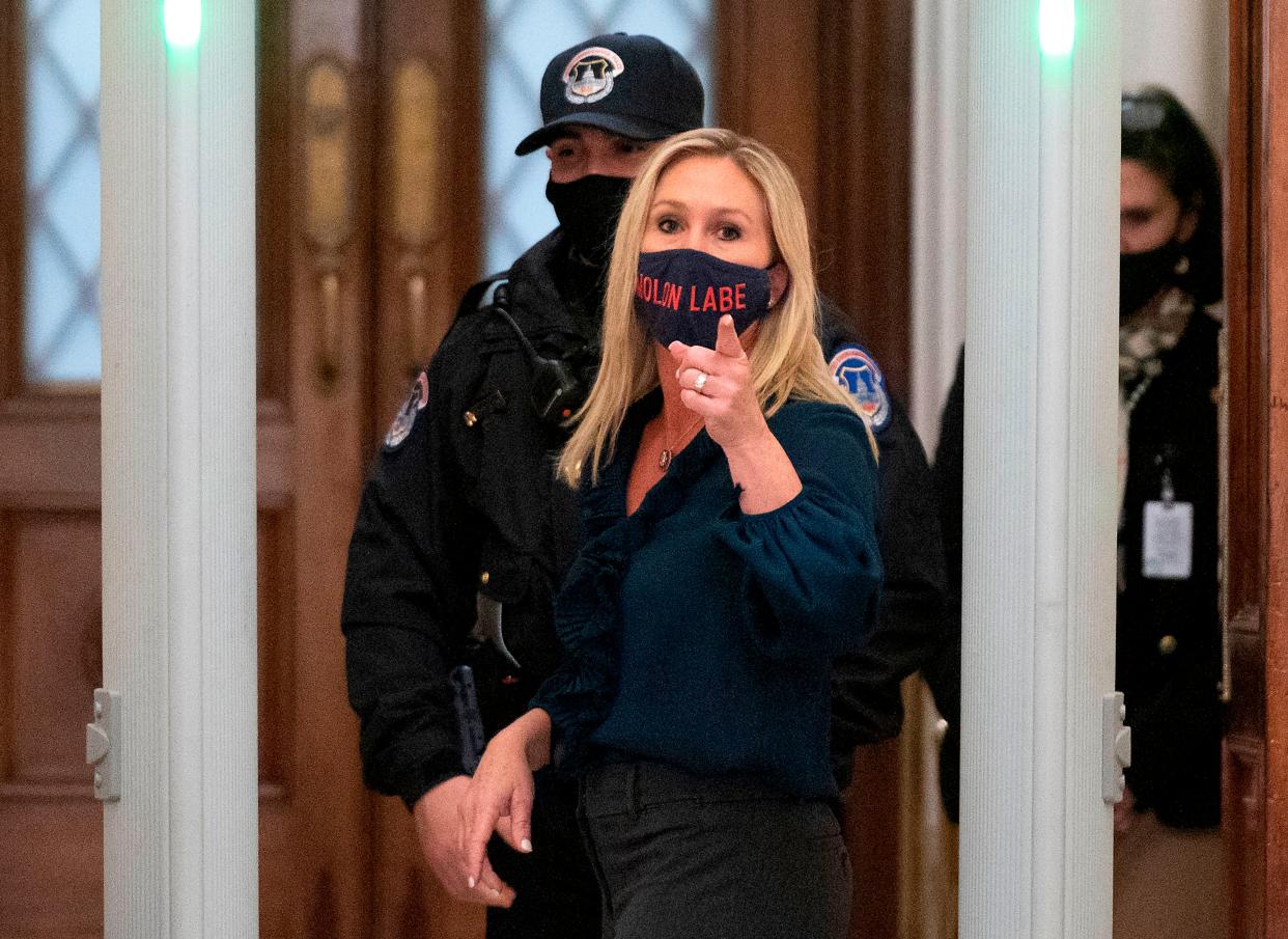 <p>Resurfaced footage shows Marjorie Taylor Greene claiming representatives needed to swear on a Bible instead of on a Quran </p> (AFP via Getty Images)