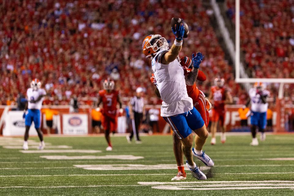 Utah Utes cornerback JaTravis Broughton (4) stops Florida Gators wide receiver Ricky Pearsall (1) from completing a catch during the season opener at Rice-Eccles Stadium in Salt Lake City on Thursday, Aug. 31, 2023. | Megan Nielsen, Deseret News