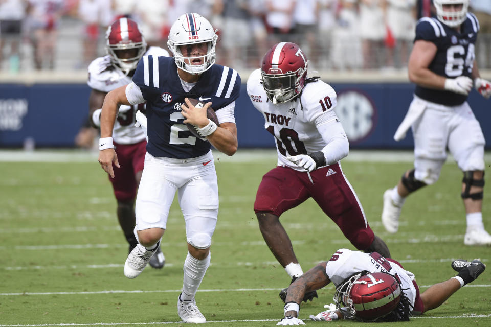 Mississippi quarterback Jaxson Dart (2) runs the ball during the first half an NCAA college football game against Troy in Oxford, Miss., Saturday, Sept. 3, 2022. (AP Photo/Thomas Graning)