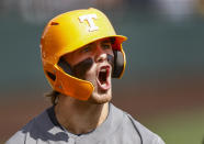 Tennessee utility Drew Gilbert reacts after hitting a home run during an NCAA college baseball super regional game against LSU, Sunday, June 13, 2021, in Knoxville, Tenn. (AP Photo/Wade Payne)