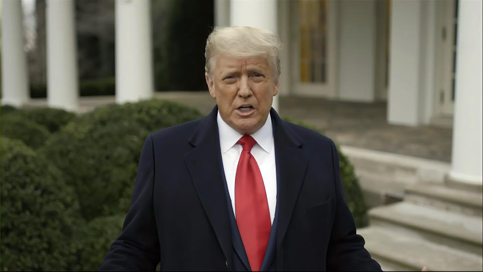 FILE - This exhibit from video released by the House Select Committee, shows President Donald Trump recording a video statement on the afternoon of Jan. 6, 2021, from the Rose Garden at the White House in Washington. Trump is making the Jan. 6, 2021 attack on the Capitol a cornerstone of his bid to return to the White House. Trump opened his first rally as the presumed Republican Party presidential nominee standing in salute with a recorded chorus of Jan. 6 prisoners singing the national anthem. (House Select Committee via AP)