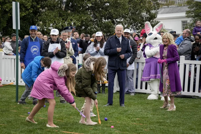 The Bidens watch as children participate in the Easter Egg Roll on the South Lawn of the White House on Monday. 