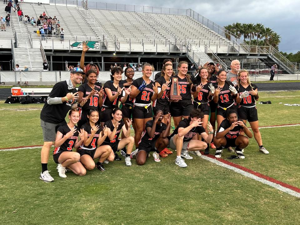 The Lincoln Park Academy flag football team celebrates after winning its third consecutive district title following a 19-14 win against Jensen Beach during the District 22-1A championship game on Thursday, April 11, 2024 from Jensen Beach High School.