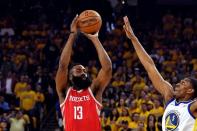 May 26, 2018; Oakland, CA, USA; Houston Rockets guard James Harden (13) shoots the ball against Golden State Warriors forward Kevon Looney (5) during the first quarter in game six of the Western conference finals of the 2018 NBA Playoffs at Oracle Arena. Mandatory Credit: Kyle Terada-USA TODAY Sports