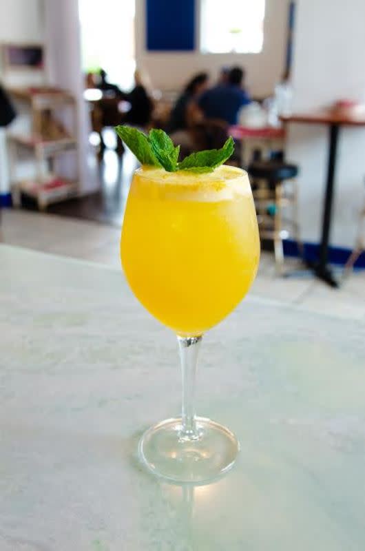 <p>DiAnoia's Eatery Pittsburgh, PA</p><p>What do you get when you cross summer's popular white wine spritz with a bellini? This creative cocktail. It combines a dry white wine, vanilla syrup and passionfruit juice for what will become a new warm-weather favorite.</p><p>Recipe Courtest of <a href="https://www.dianoiaseatery.com/" rel="nofollow noopener" target="_blank" data-ylk="slk:DiAnoia's Eatery;elm:context_link;itc:0;sec:content-canvas" class="link rapid-noclick-resp">DiAnoia's Eatery</a> in Pittsburgh, PA:</p><p>• 1 oz vodka </p><p>• 1 oz cranberry syrup </p><p>• 1 whole grapefruit juiced </p><p>• Grapefruit twist and half a salt rim for garnish</p>