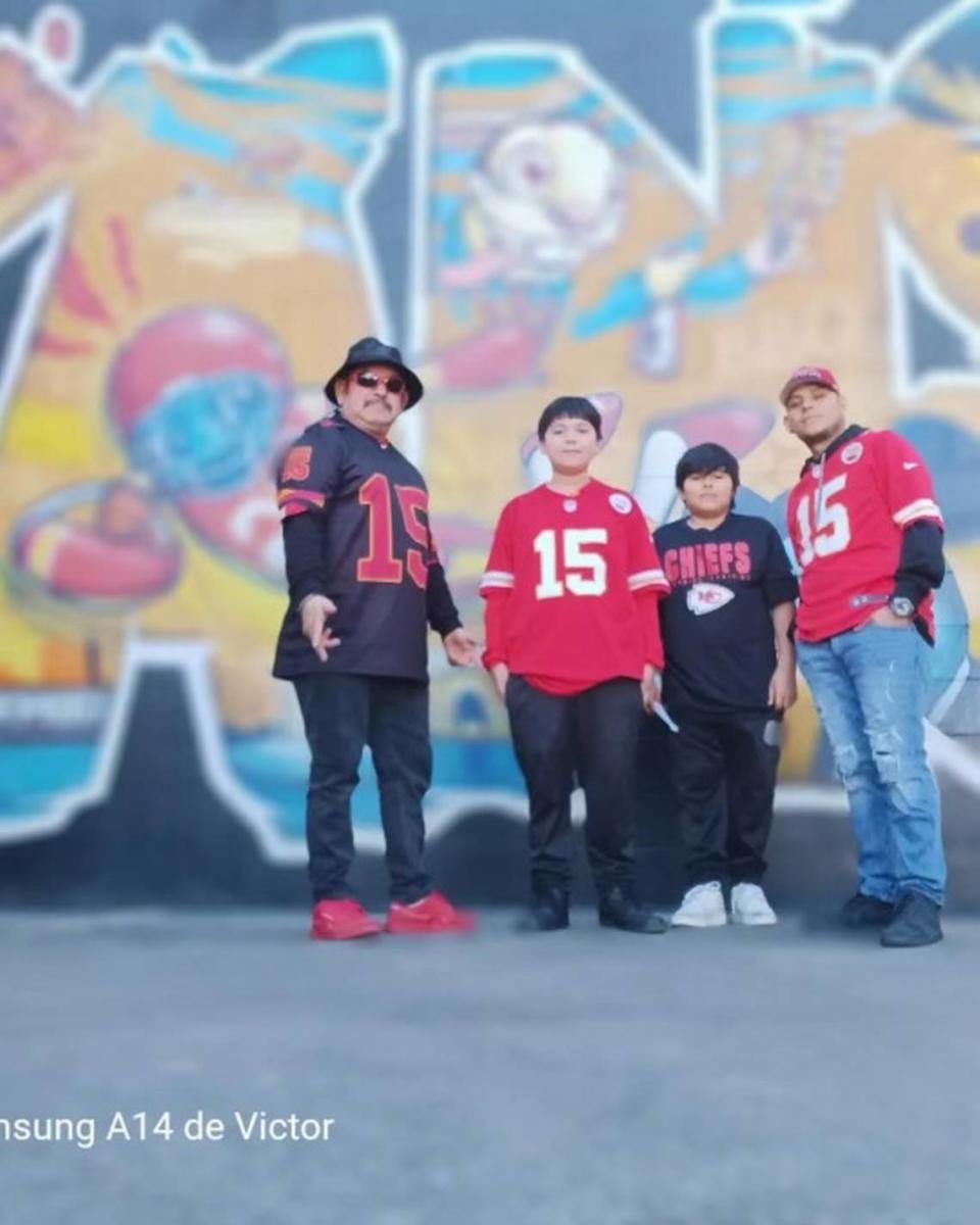 Samuel Arellano, 10, second from left, with his grandfather Victor Salas Sr., cousin Isaac Salas, 10, and uncle Victor Salas Jr., on the day of the Kansas City Chiefs Super Bowl victory celebration.