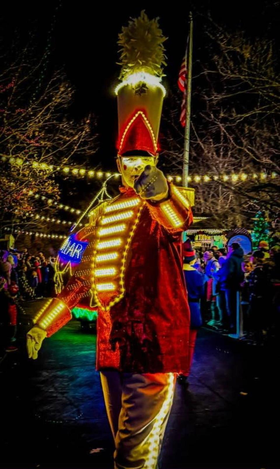 Larry Hoover, known as "Shorty Hatfield," performs at the Tall Toy Solder during Silver Dollar City's Christmas parade. Hoover celebrated his 27th season at the park in 2023.