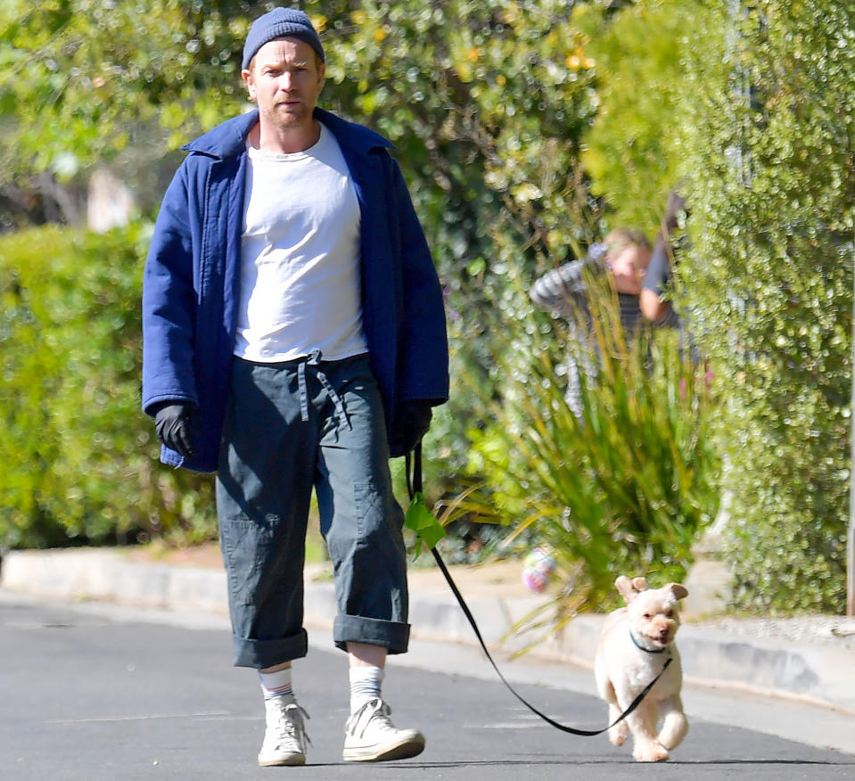 <p>Ewan McGregor steps out in Santa Monica, California, wearing rubber gloves while walking his dog on Saturday.</p>