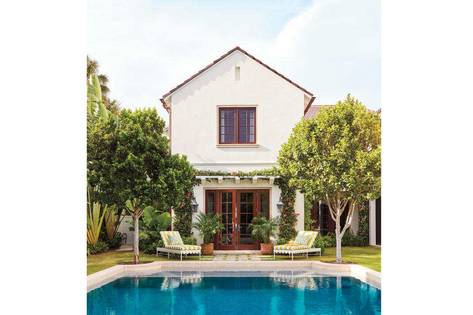 <p>It isn’t every day that an empty lot comes on the market in the historic town, so when it did, these homeowners jumped—and built an island escape with all the character of Old Florida.</p> <p>Pigeon plum trees and bougainvillea flank the French doors leading to the master bedroom. The pavers are crafted of coquina, a durable stone that stays cool under the hot Florida sun, and the powder-coated steel loungers are from the Celerie Kemble collection.</p>