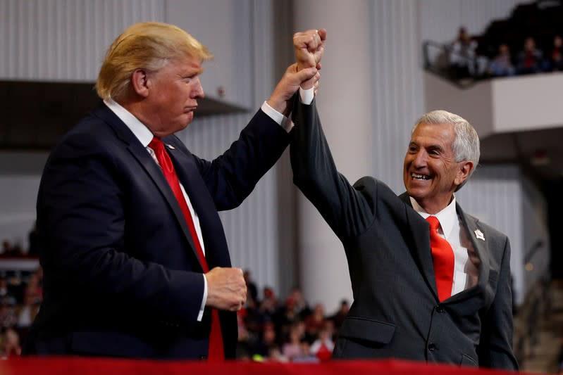 FILE PHOTO: President Donald Trump delivers remarks during a campaign rally in Bossier City, U.S.