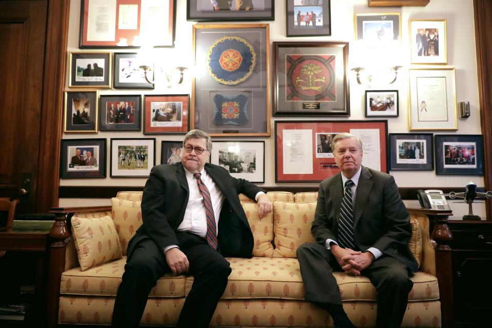 WASHINGTON, DC - JANUARY 09: Attorney General nominee William Barr (L) poses for photographs before a meeting with Senate Judiciary Committee member Sen. Lindsey Graham (R-SC) in his office in the Russell Senate Office Building on Capitol Hill January 09, 2019 in Washington, DC. Barr's confirmation hearing is scheduled for next week.  (Photo by Chip Somodevilla/Getty Images) ORG XMIT: 775279432 ORIG FILE ID: 1091785708