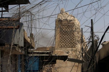 The destroyed al-Hadba minaret at Grand al-Nuri Mosque is seen at the Old City in Mosul, Iraq, June 30, 2017. REUTERS/Alaa Al-Marjani