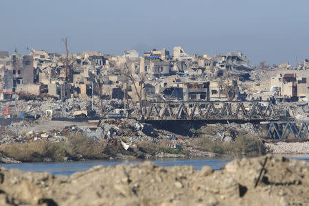 Destroyed buildings from previous clashes are seen in Mosul, Iraq, January 10, 2018. Picture taken January 10, 2018. To match Special Report IRAQ-MOSUL/OFFICIAL REUTERS/Ari Jalal