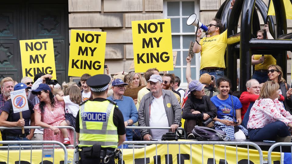 Protesters massed on the Royal Mile ahead of the service of thanksgiving. - Danny Lawson/Getty Images