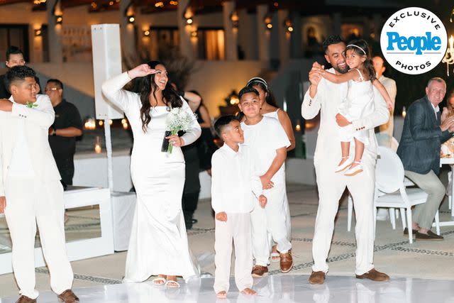 <p>MC Weddings</p> Tony Finau (right) and Alayna Finau (second left) at their vow renewal in Los Cabos in November 2023