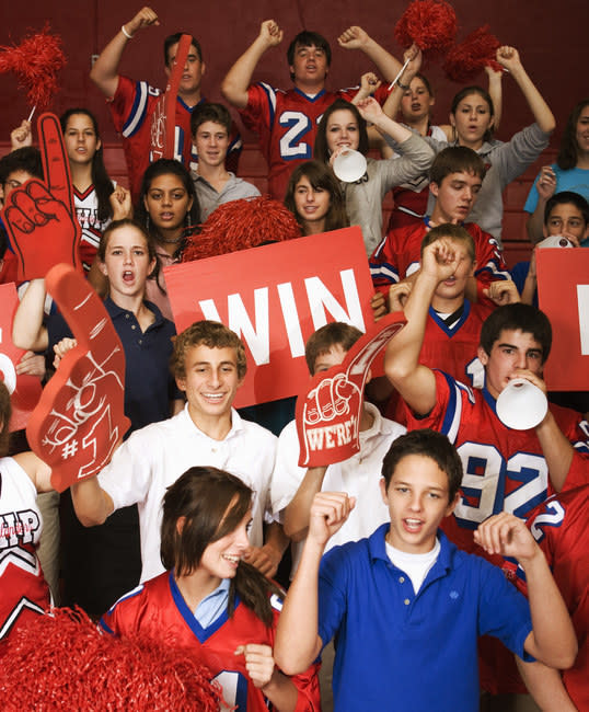 Young athletes and spectators at a pep rally