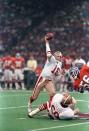 FILE PHOTO: JOE MONTANA SCRAMBLES FOR YARDAGE DURING THE FIRST QUARTER SUPER BOWLXXIV.