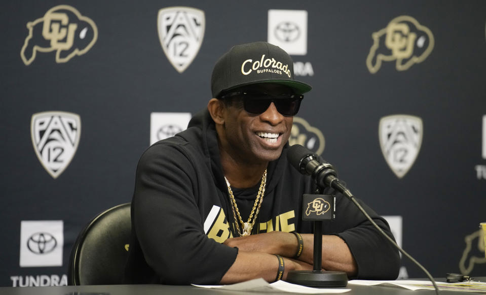 Colorado head coach Deion Sanders has brought a ton of buzz to the program in his first year as head coach. Will that translate to a lot of wins? (AP Photo/David Zalubowski)