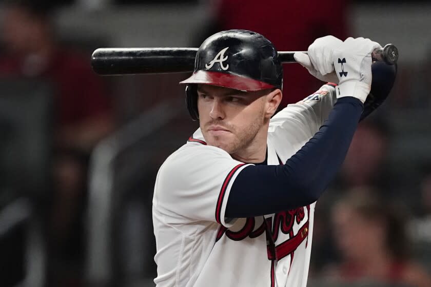 Atlanta Braves first baseman Freddie Freeman (5) bats during a baseball game.