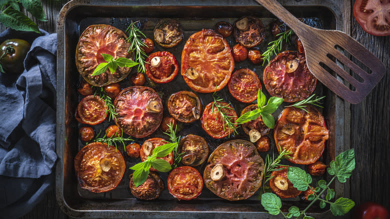 roasted tomatoes on baking sheet