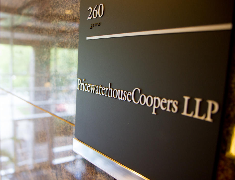 A sign outside the PricewaterhouseCoopers office in Franklin, Tenn., is seen on Wednesday, Sept. 5, 2012. The Secret Service said is investigating the reported theft of copies houses Republican presidential candidate Mitt Romney's federal tax records during a break-in at the office. The company said there was no evidence that any Romney tax files were stolen. (AP Photo/Erik Schelzig)