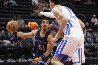 Memphis Grizzlies guard Tremont Waters (51) is defended by Oklahoma City Thunder forward Chet Holmgren (7) and another player during the first half of an NBA summer league basketball game Wednesday, July 6, 2022, in Salt Lake City. (AP Photo/Jeff Swinger)