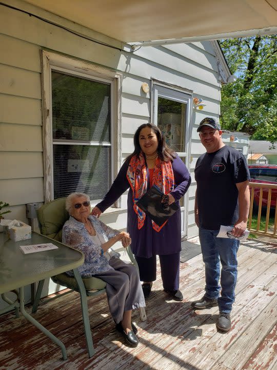 Nellie (left) at her Hero Street home with grandson Brian, and <a href="https://www.usmcocma.org/consul-general-named" rel="nofollow noopener" target="_blank" data-ylk="slk:Ambassador Reyna Torres Mendivil;elm:context_link;itc:0;sec:content-canvas" class="link ">Ambassador Reyna Torres Mendivil</a>, Consul General of Mexico in Chicago, who visited Hero Street for the 2023 Veterans Day ceremony. That was the first time a Consul General of Mexico visited Hero Street.