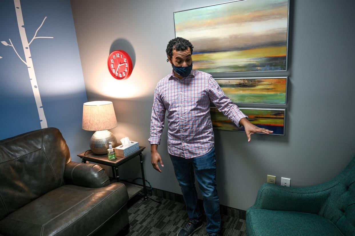 Alex Brace, executive director and therapistat Small Talk Children's Advocacy Center, talks about one of the child interview rooms on Tuesday, Nov. 30, 2021, in Lansing.