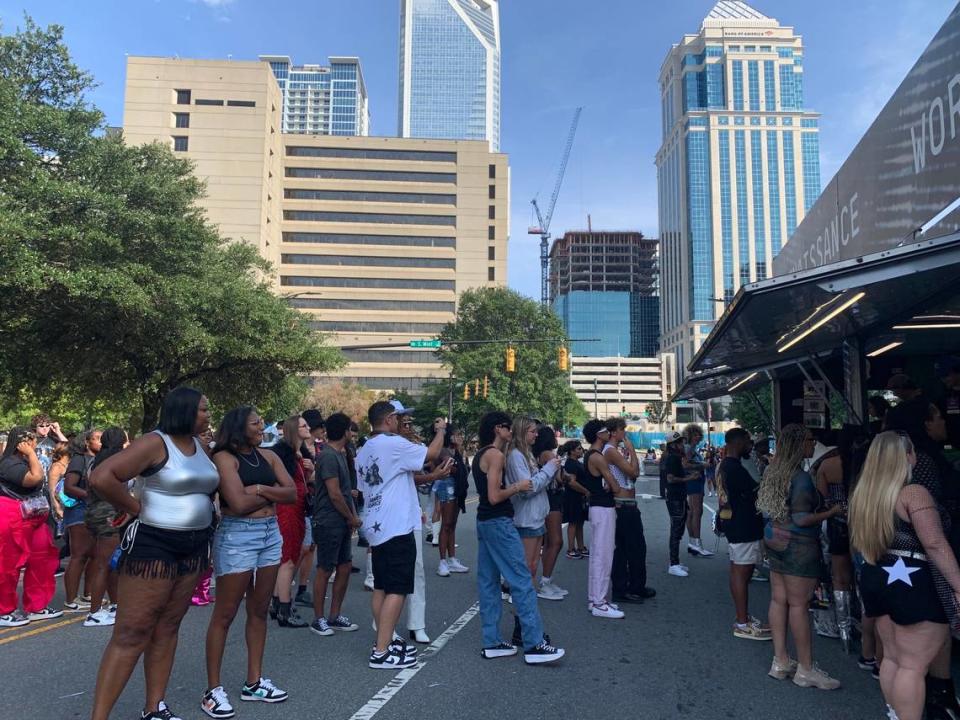 Beyoncé fans wait in merchandise lines ahead of gates opening. The merchandise truck, which sat just off the corner of S. Mint and S. Graham streets outside Bank of America Stadium.