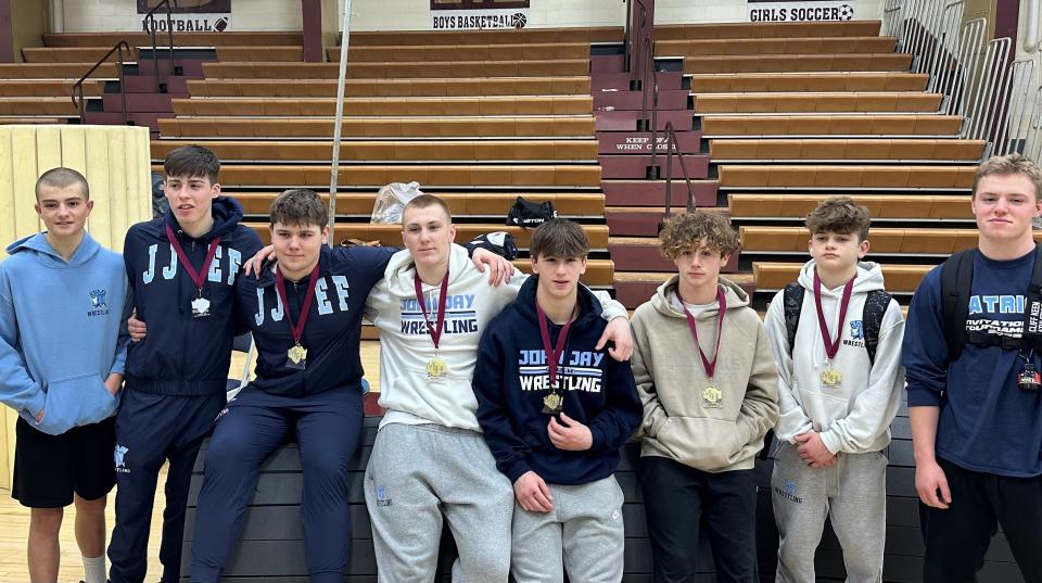 Members of the John Jay-East Fishkill team, including Logan Mohl, Michael Mauro, Brandon DellaPia, Kevin Murphy, Christian Martino and Ryan Fitzpatrick, who each medaled in the Mid Hudson Wrestling Tournament on Dec. 28, 2023.