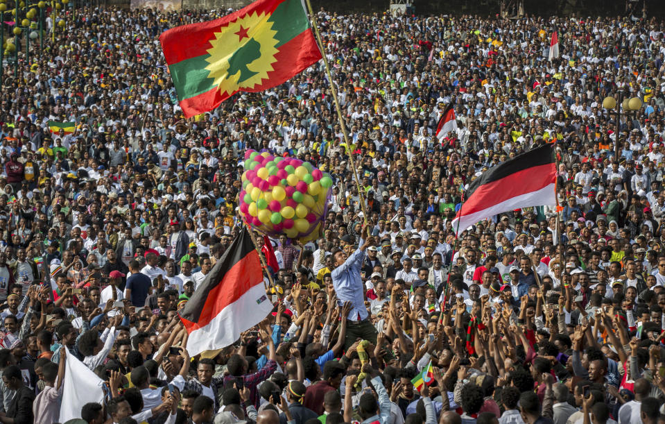 FILE - In this Saturday, June 23, 2018 file photo, Ethiopians rally in solidarity with Prime Minister Abiy Ahmed in Meskel Square in the capital, Addis Ababa, Ethiopia. Ethiopia's ruling coalition is expected to take the next steps this week on sweeping reforms announced under its new prime minister as it begins its first congress on Wednesday, Oct. 3, 2018 since Ahmed took power in April. (AP Photo/Mulugeta Ayene, File)