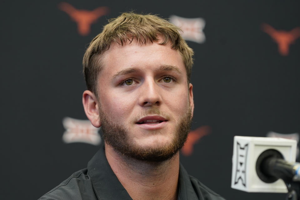 FILE - Texas quarterback Quinn Ewers speaks to reporters at the NCAA college football Big 12 media days in Arlington, Texas, Wednesday, July 12, 2023. Texas opens their season at home against Rice on Sept. 2. (AP Photo/LM Otero)