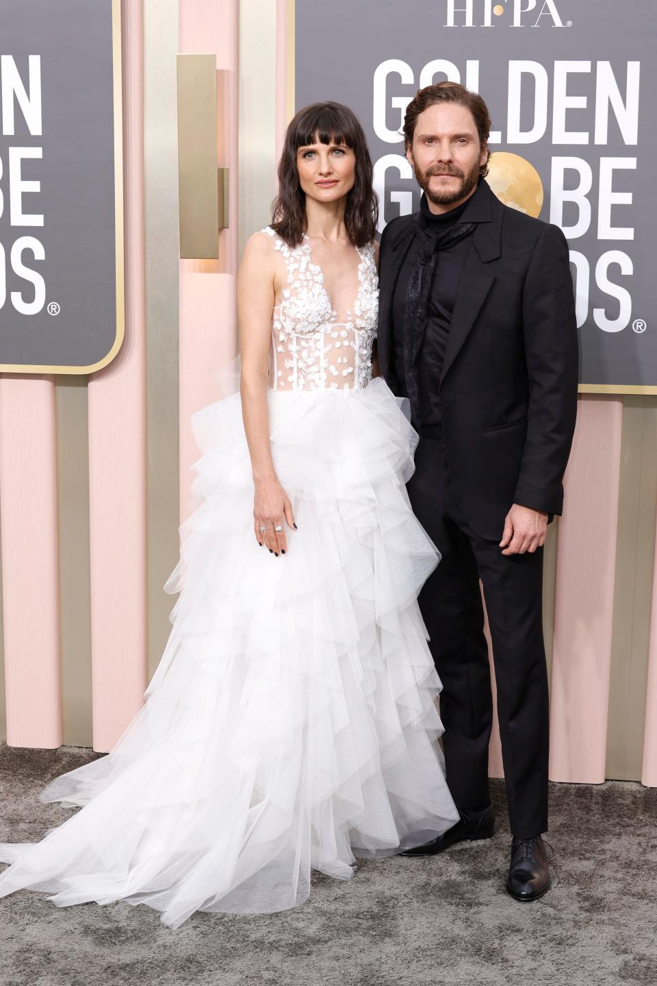 Felicitas Rombold and Daniel Brühl at the 2023 golden globes