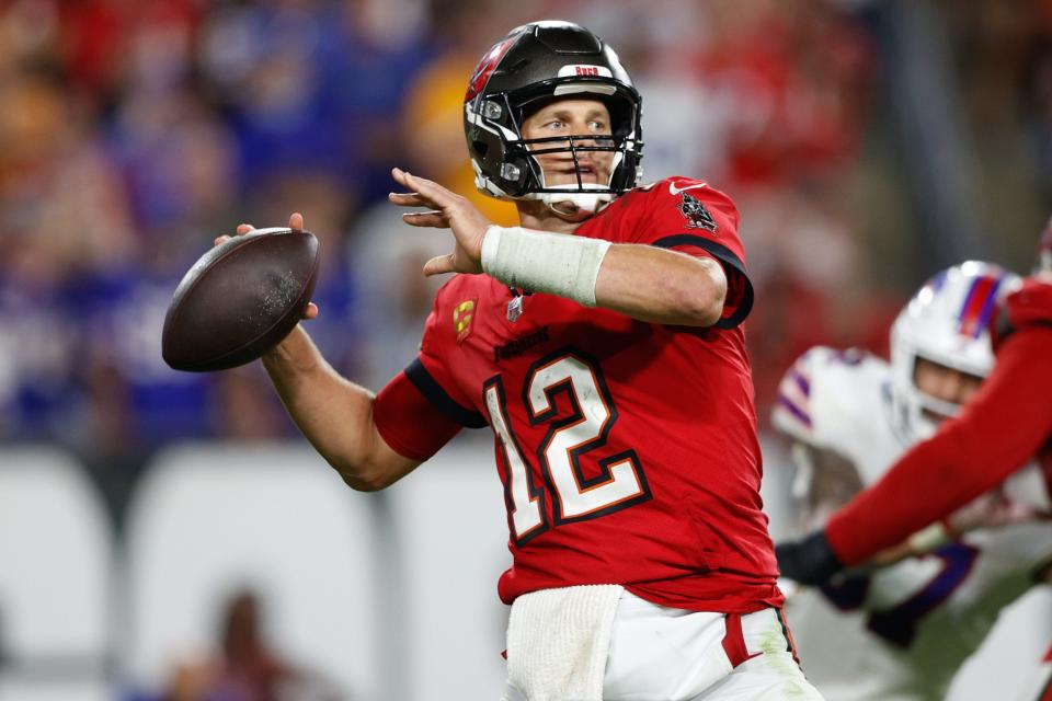 Tom Brady threw for 2 TDs - including the game-winner - and ran for another as the Buccaneers defeated the Bills in OT.