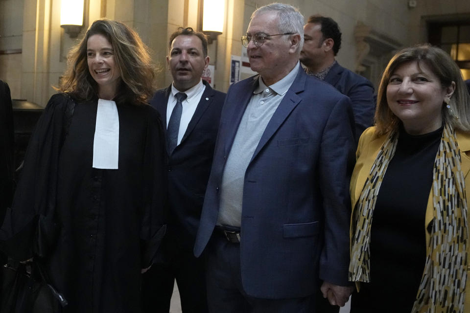 Lawyer Clemence Bectarte, left, arrives at the court room with Syrian lawyer Mazen Darwish, second left, Obeida Dabbagh,brother of Mazen Dabbagh, second right and his wife Hanane, Tuesday, May 21, 2024 at the courtroom in Paris. A Paris court will this week seek to determine whether Syrian intelligence officials — the most senior to go on trial in a European court over crimes allegedly committed during the country's civil war — were responsible for the 2013 disappearance and deaths of Patrick and his father Mazen. (AP Photo/Michel Euler)