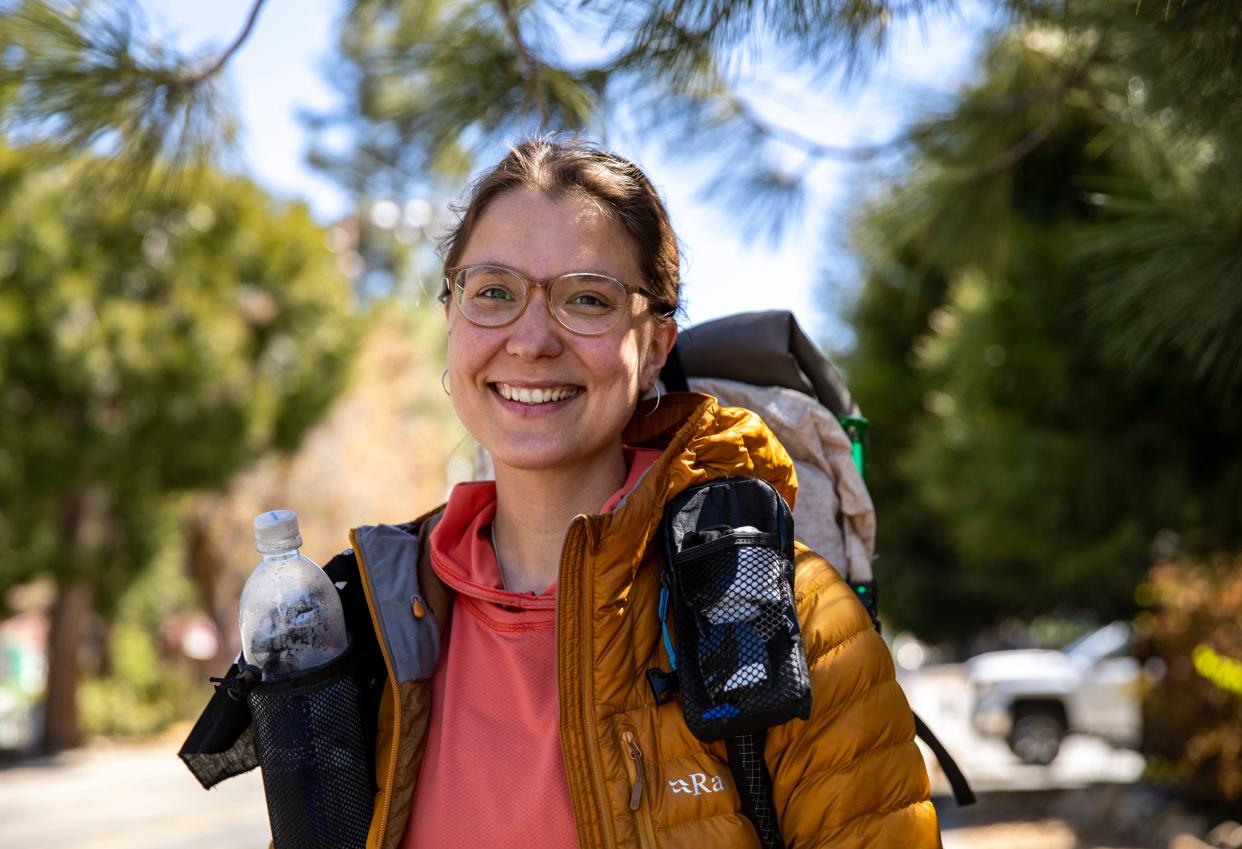 PCT hiker Iris Sojer poses for a photo while taking a break from the trail in Idyllwild, Calif., Thursday, May 11, 2023. 