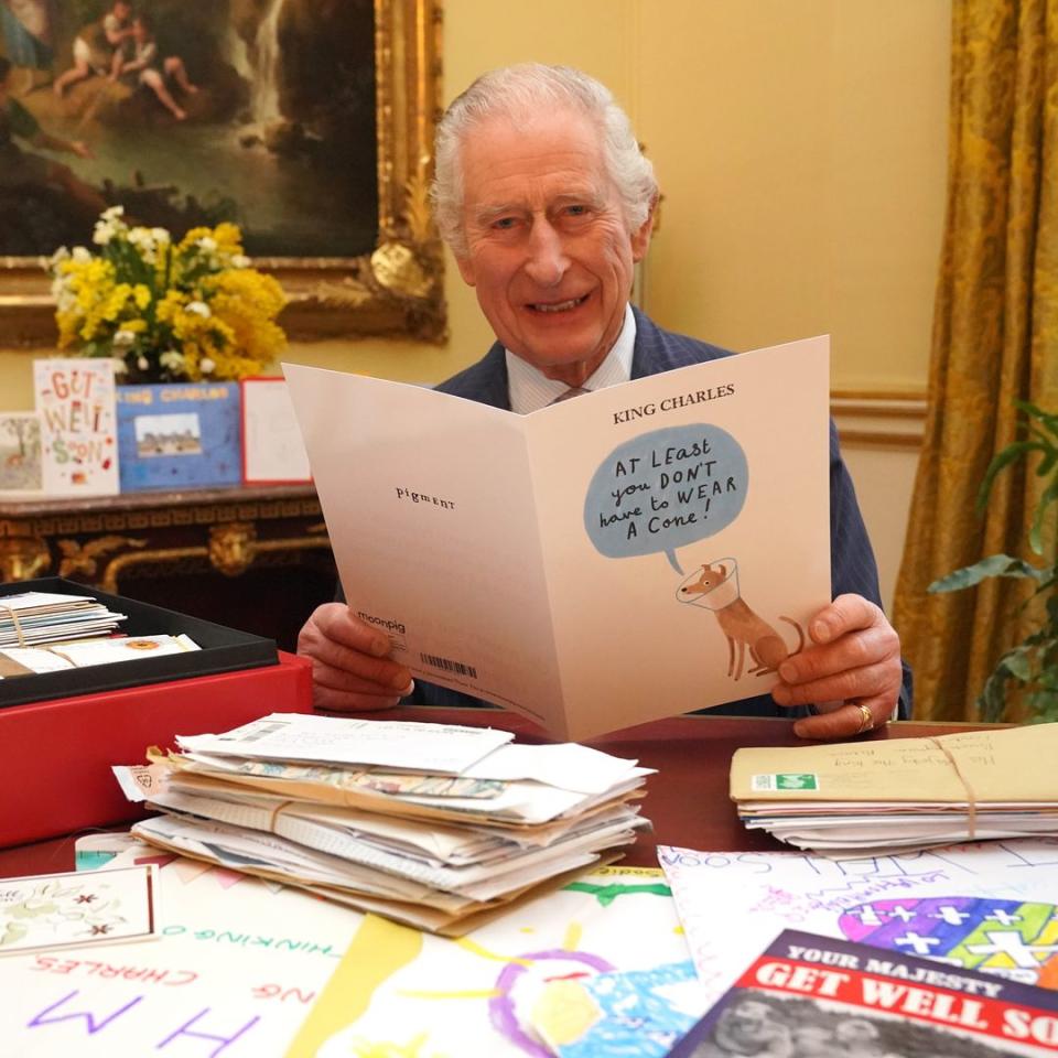 King Charles looks visibly touched as he's inundated with get well cards from the public