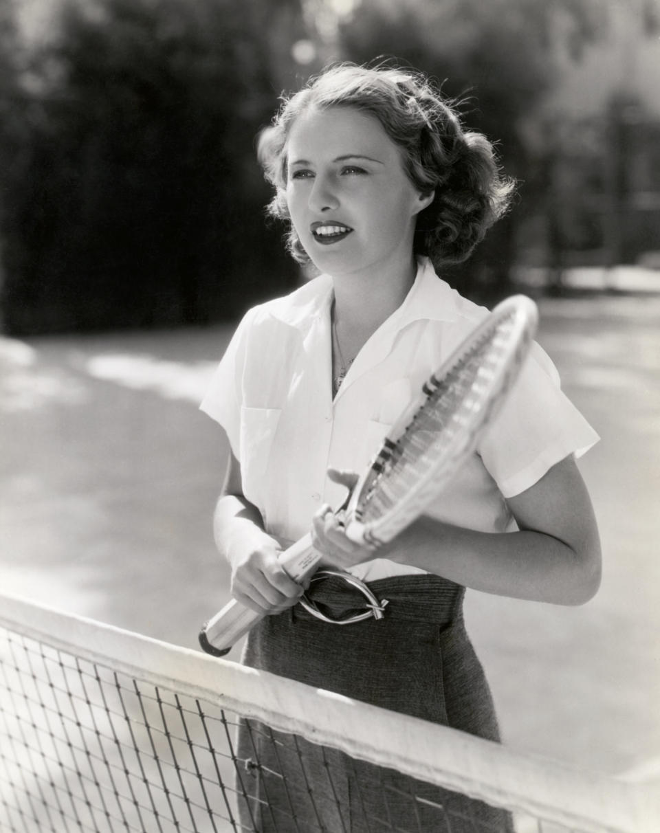 Barbara Stanwyck in action on the tennis court, 1934.&nbsp;