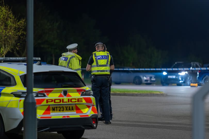 Police at the scene of a fatal crash outside a church in Balmedie