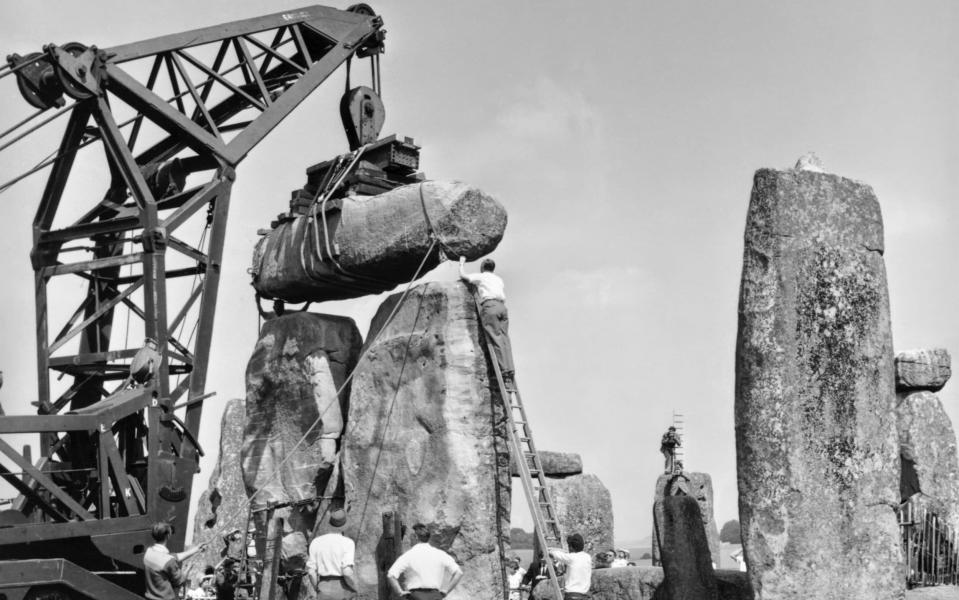 Making repairs to Stonehenge in 1920 - English Heritage. NMR