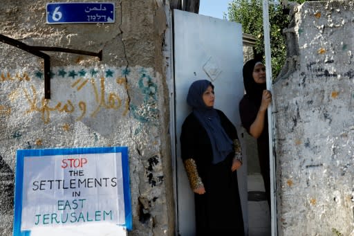 Palestinians look towards a protest against the eviction of Palestinian families from their homes in the east Jerusalem neighbourhood of Sheikh Jarrah on August 4, 2017