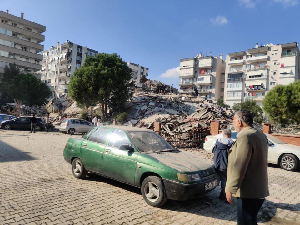 Image: The debris of collapsed buildings in Izmir, Turkey (Mehmet Emin Menguarslan / Anadolu Agency via Getty Images)