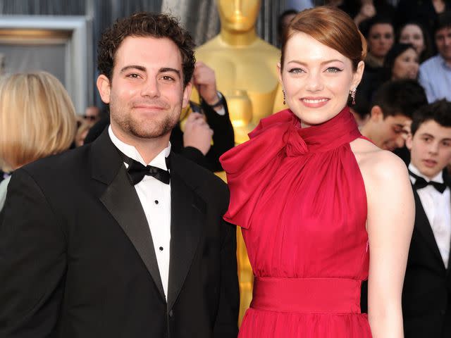 <p>Kevin Mazur/WireImage</p> Emma Stone and Spencer Stone at the Academy Awards in 2012.