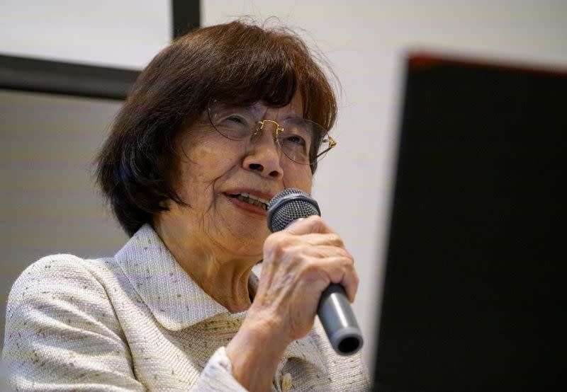 Atomic bomb survivor Teruko Yahata speaks to foreign visitors in Hiroshima