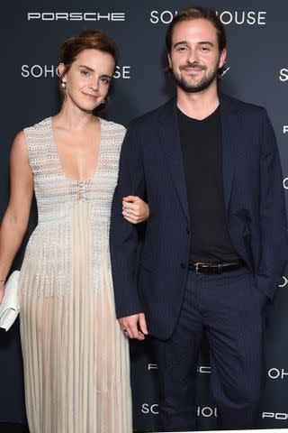 <p>Gilbert Flores/WWD via Getty</p> Emma Watson and Alex Watson at The Soho House Awards