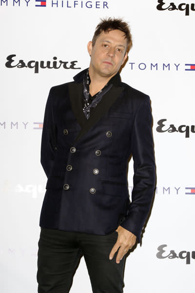 <b>Jamie Hince</b><br><br>Kate Moss' husband wore a military-style navy jacket and scarf as he posed for photographers at the Tommy Hilfiger and Esquire party at The Zetter Townhouse.