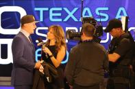 Johnny Manziel is interviewed by Suzy Kolber after being selected by the Cleveland Browns at the 2014 NFL Draft at Radio City on Thursday, May 8th, 2014 in New York, NY. (AP Photo/Gregory Payan)